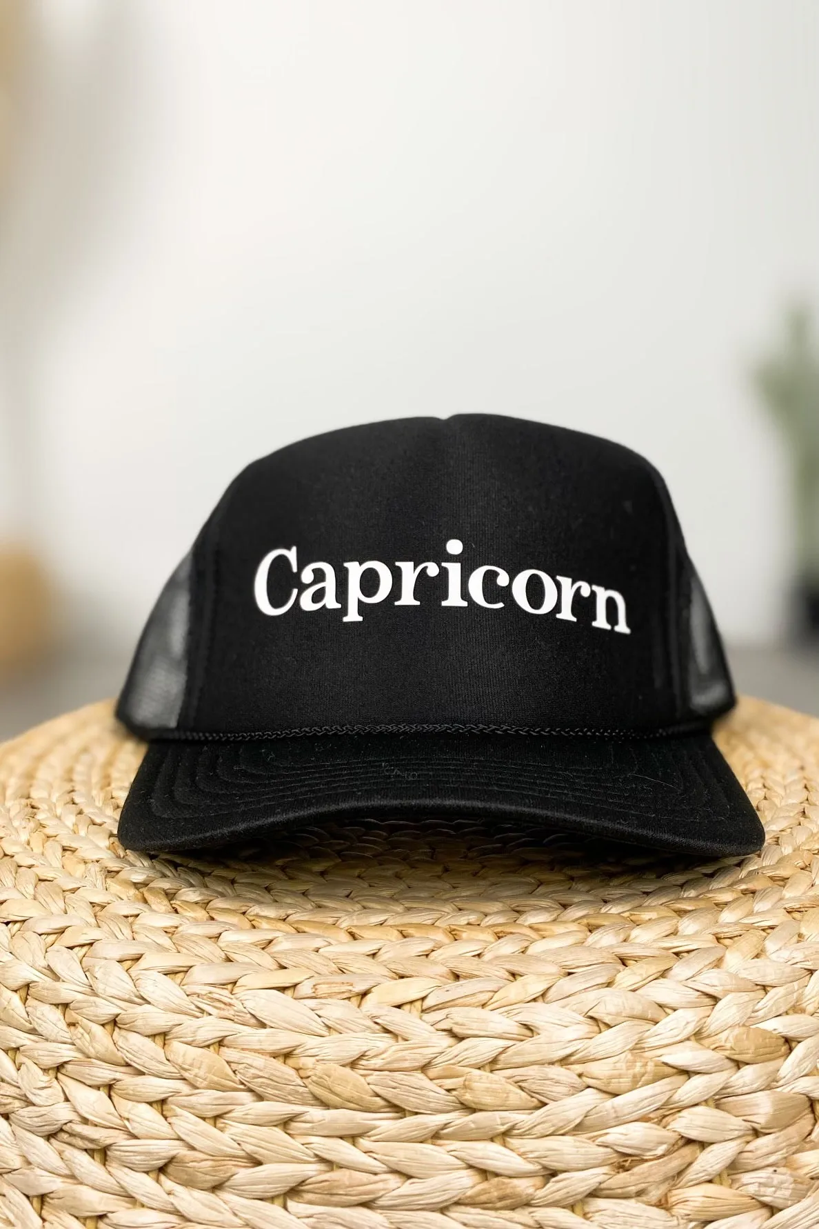 Capricorn trucker hat black