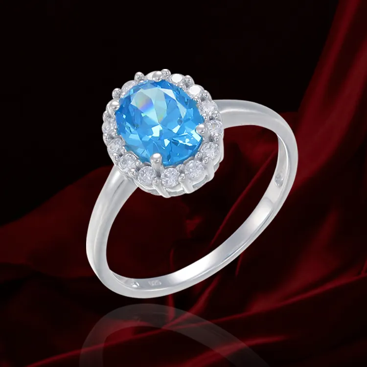 Delicate Sparkling Blue Ring with Halo